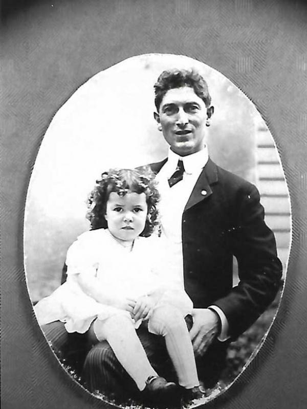 Nola on her father's lap